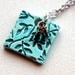 Necklace, Embossed tile pendant with Swarovski Crystals