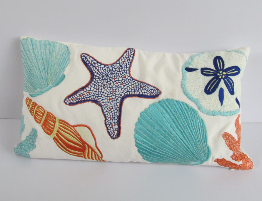 Beach themed pillow cover in off white with sea creatures 12X18 inch.
