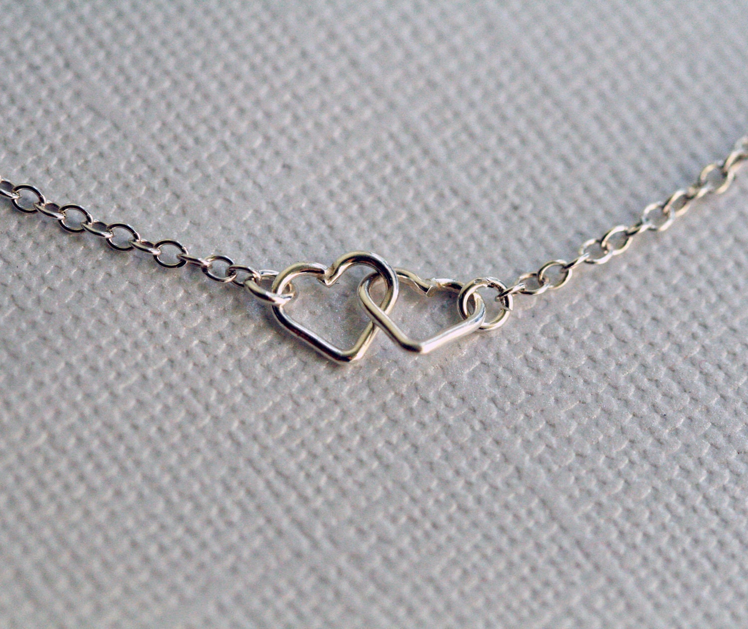 Two Tiny Linked Hearts Sterling Silver Bracelet