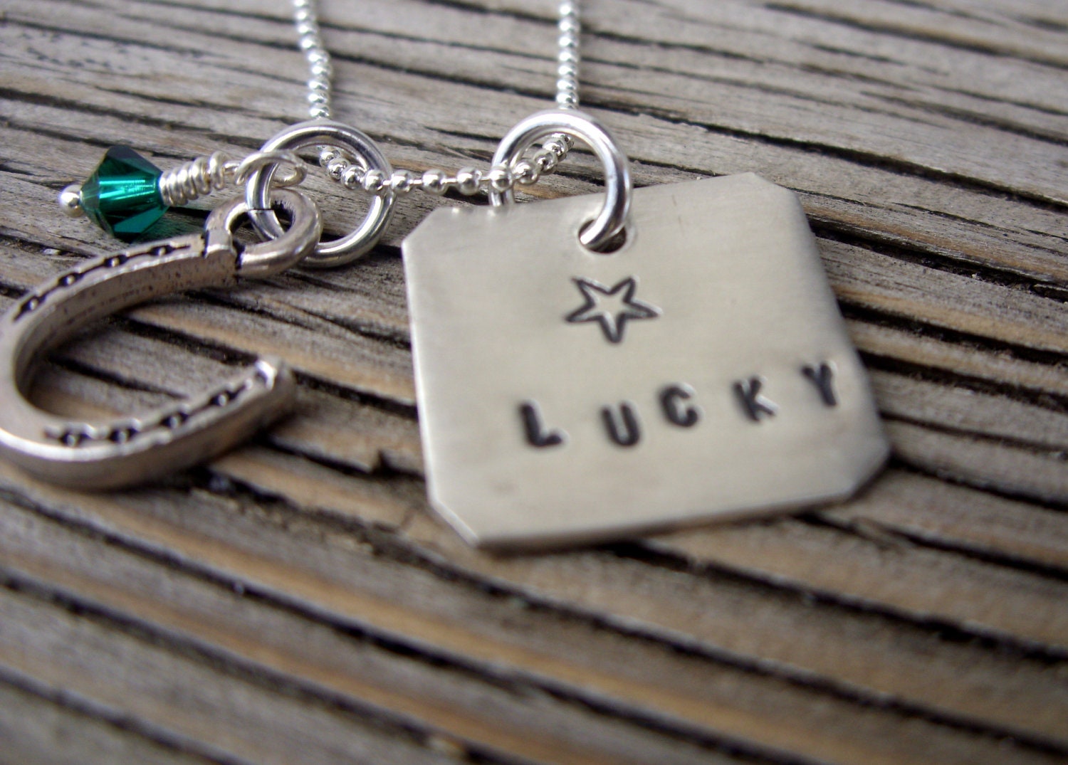 Lucky- sterling silver hand stamped pendant tag with green swarovski crystal and horseshoe charm