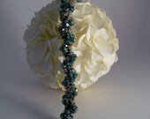 handmade woven lucious green spiral twist bracelet with sterling silver floral clasp