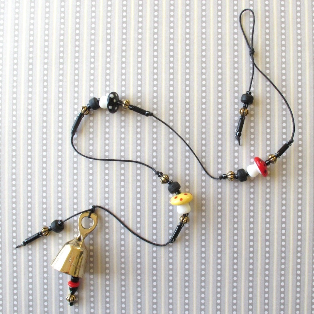 Beaded Garden Chime:  Windchime with Mirthful Mushrooms.  Lampwork Glass Toadstool Beads in Red, Yellow & Black.  Brass Bell