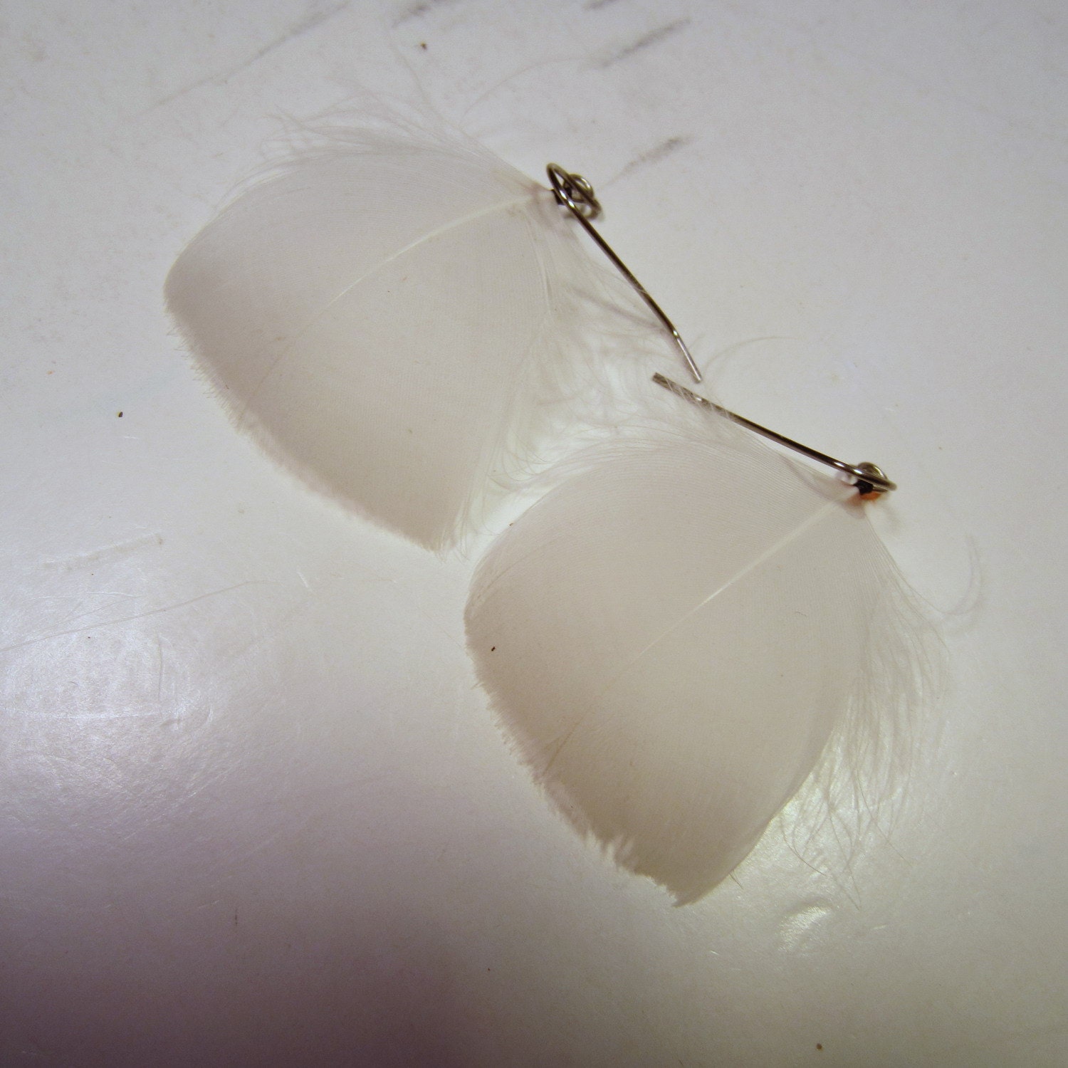 white Goose Feather Earrings cruelty free