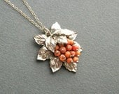 1930s Coral Currants Pendant with Rhodium Leaves.