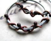 Hoop earrings hammered sterling silver hoops wrapped in copper snakes rustic everyday staples - Medusa
