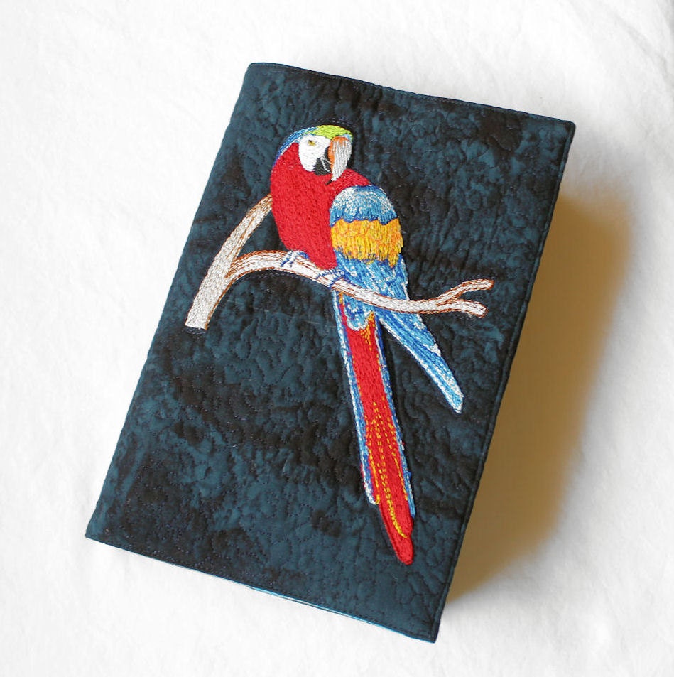 Embroidered Parrot Paperback Book Cover on Cotton Batik Fabric Trade Size