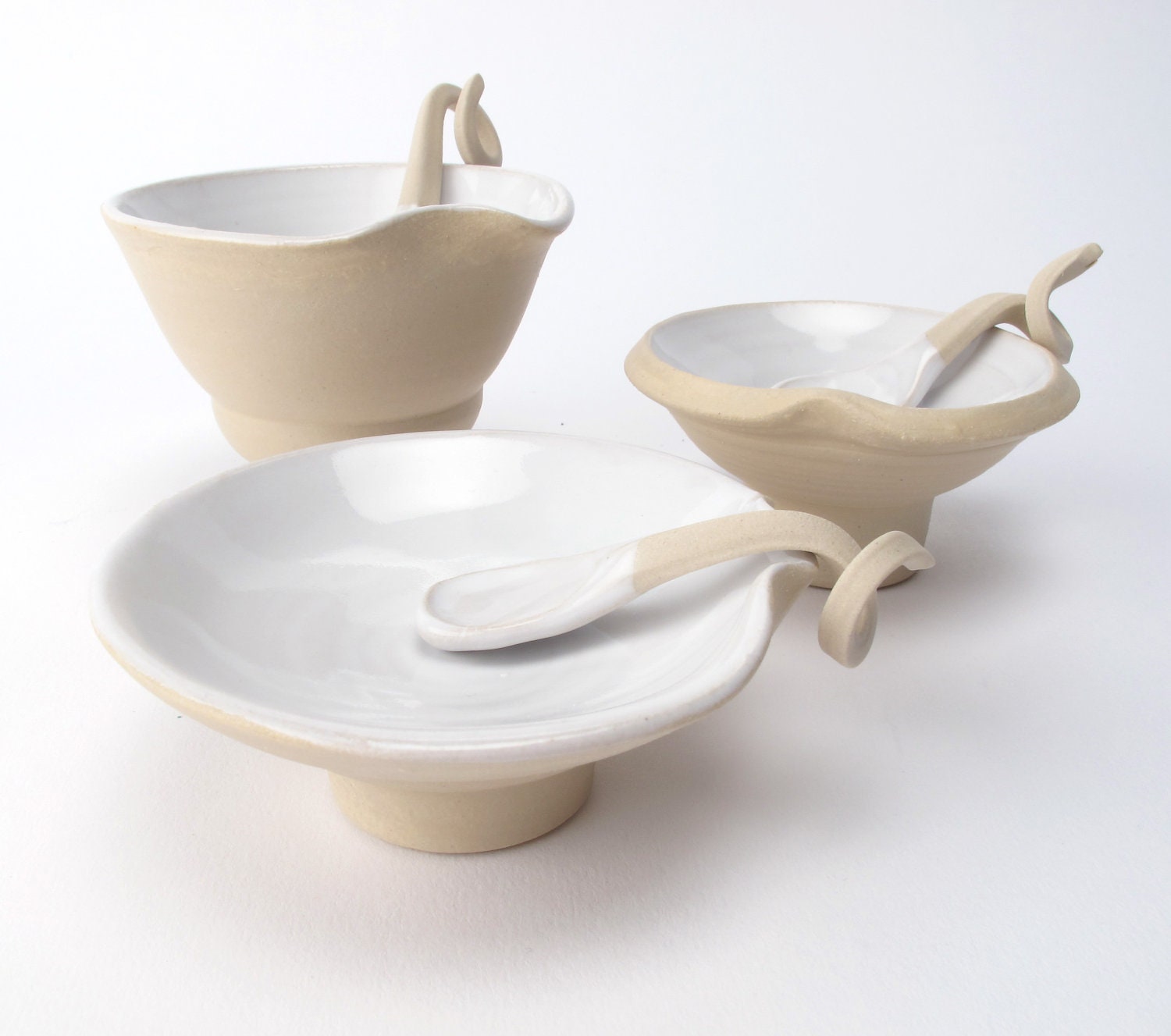3 Amuse Bowls with curly spoons