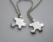 Small Puzzle Piece Necklaces. His and Hers Couple Necklaces in Silver Finish.