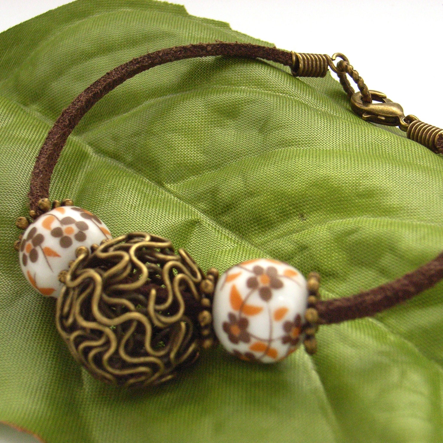 Cord bracelet orange bronze wire ceramic bead UK seller