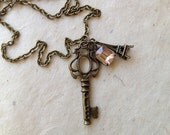 Key to Paris Pendant, vintage champagne rhinestone, skeleton key, Eiffel Tower, antique bronze necklace