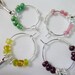 Set of 4 beaded Wine Bottle Charms in pink, maroon, yellow and green