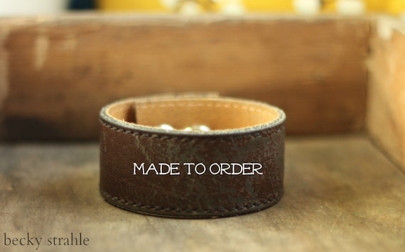 Dark brown distressed leather cuff...made to order.