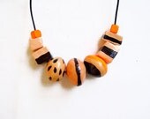 Pumpkin Pie Geometric Necklace in neon orange and black - Primitive Organics Collection - Handmade Clay Beaded Necklace - AlinaandT
