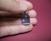 An unidentified sunken vessel in a tiny bottle  -Bottle ship-