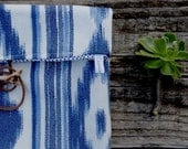 Ikat print pouch in blue and white with twig button
