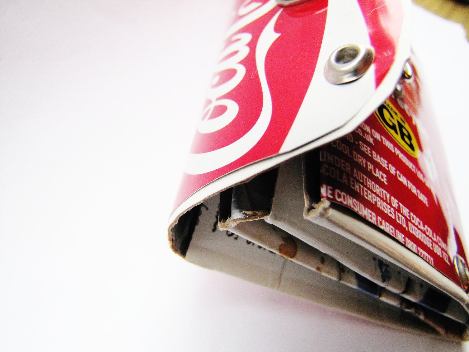 Small wallet / purse, made from Recycled Coca Cola can and Tetra Pac carton.
