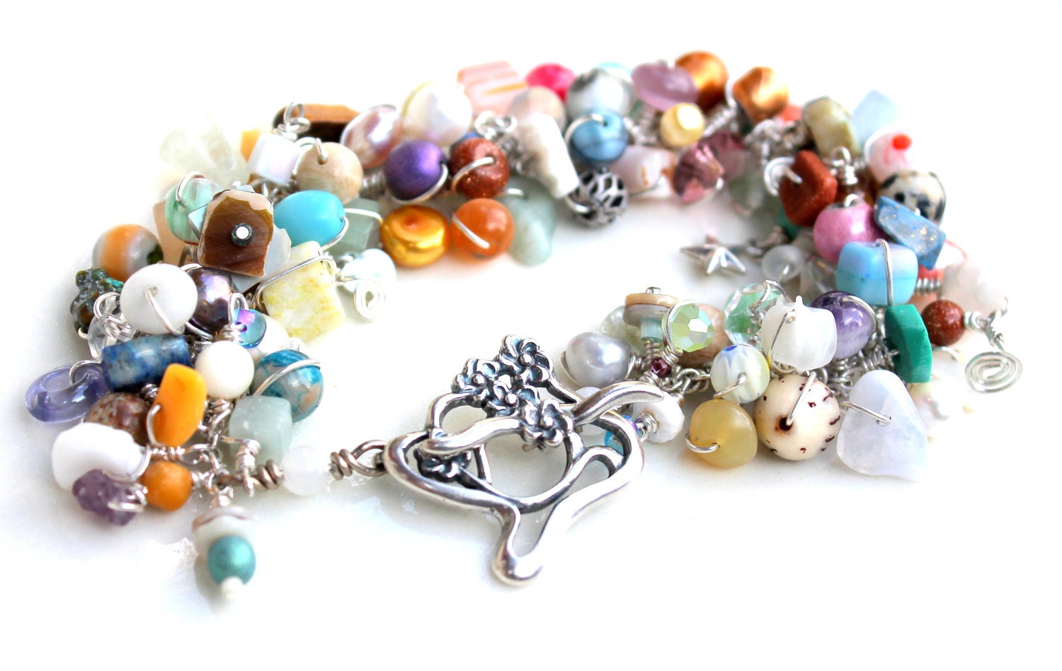 uniquenecks bracelet. sterling silver wire wrapped handmade beaded bracelet soft colors wrapped gemstone beads bracelet