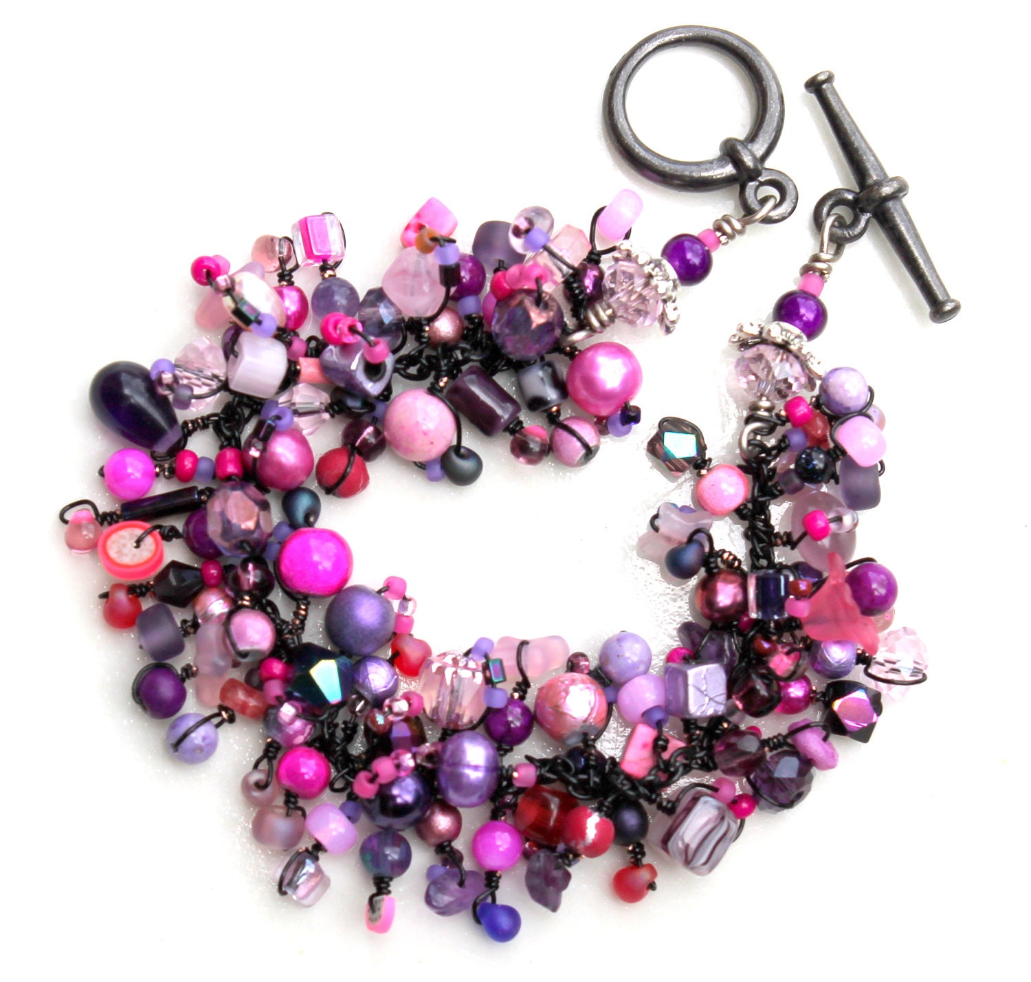 goth girl bracelet. pink and purple beaded jewelry.black wire wraps