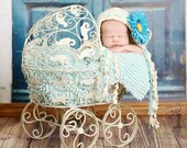 Newborn Cream and Turquoise Elf Pixie Bonnet Hat with Cream Ruffled Trim and flower trim