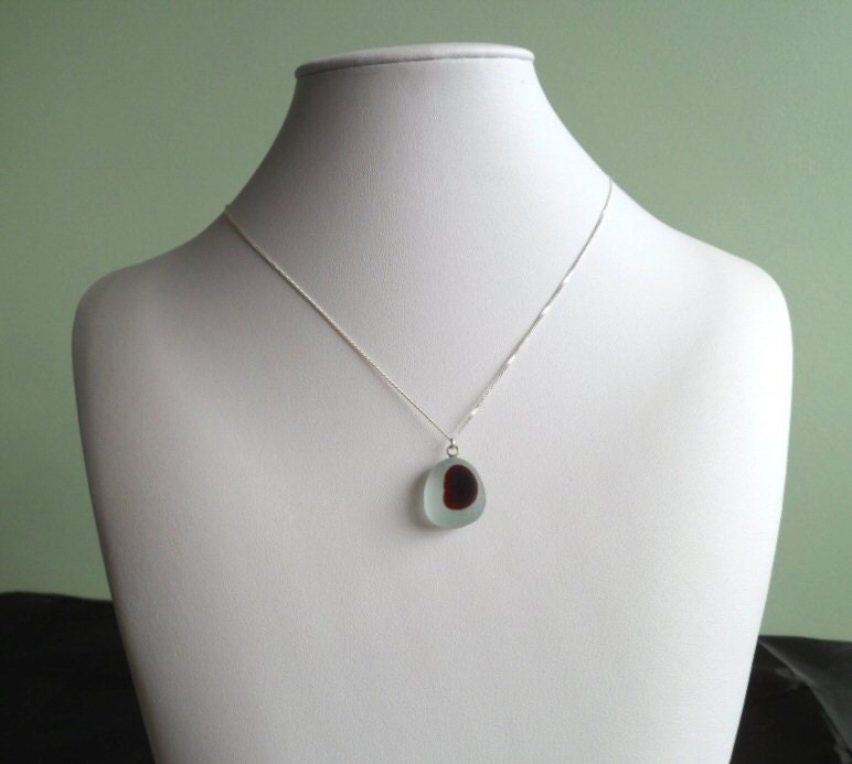 Rare Victorian English seaglass pendant  Ruby Red kidney shape  sitting on ice white frosted base ASG40