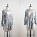 1970's vintage floral blouse. 70's crepe top. blue. print. pastel. boho hippie. sheer blouse 70.