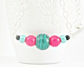 Ultramarine green, hot pink and black necklace and matching earrings set