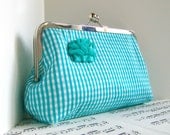 Turquoise blue gingham silk clutch bag with flower