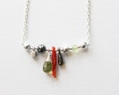 Sundries Necklace --- sterling silver, glass, hematite, peridot and coral