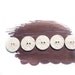 White creamy imprinted buttons