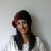With a Gift.There is a gift for who buy this lovely hat.red,black,beanie,knit,valentine