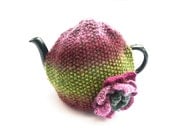 Tea Pot Cosy OOAK hand knitted in 100%  multi coloured yarn purples and greens with big bold crochet flower