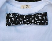Organic cotton onesie with skull bowtie