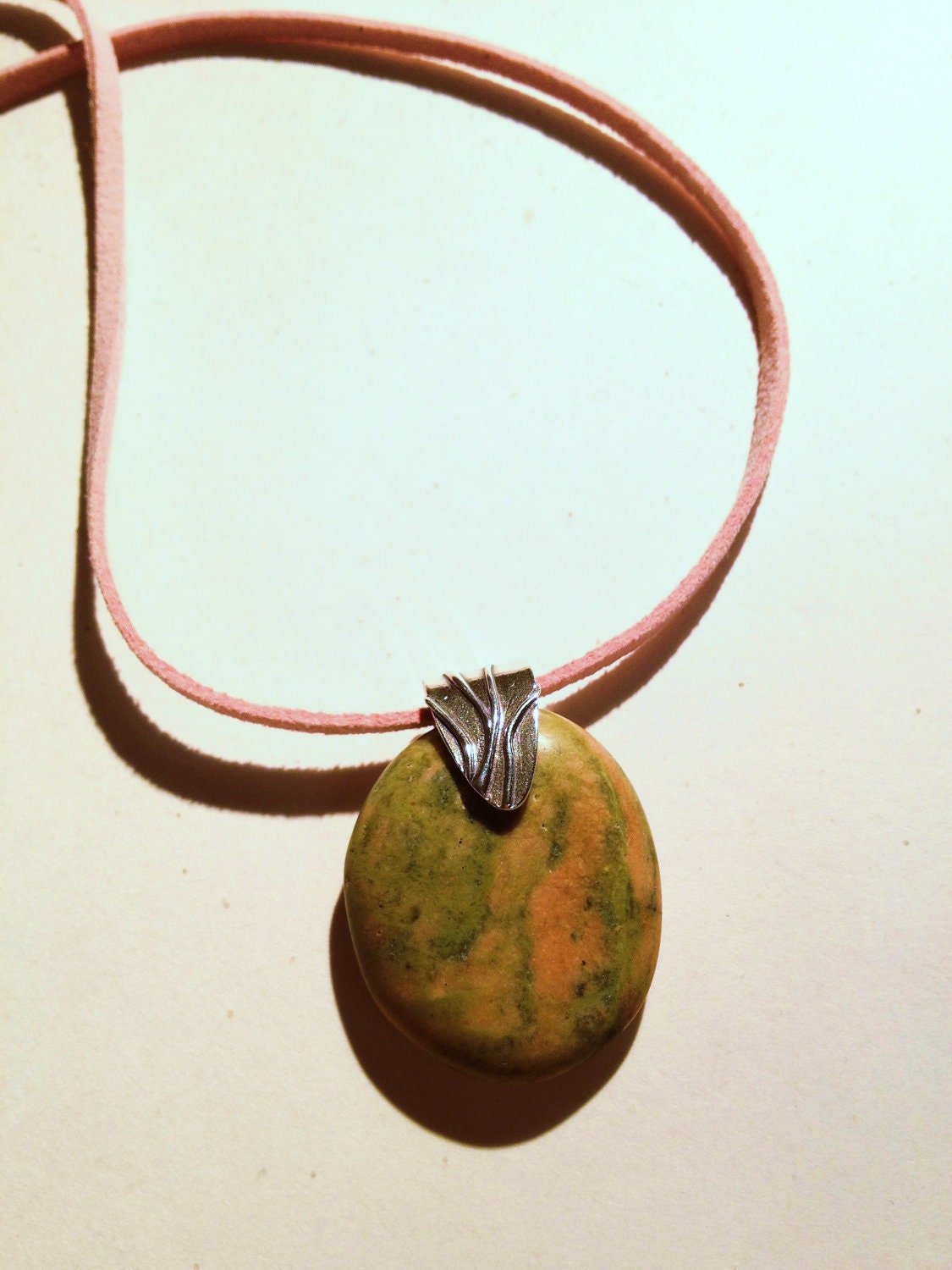 Pink and green stone and suede necklace pendant