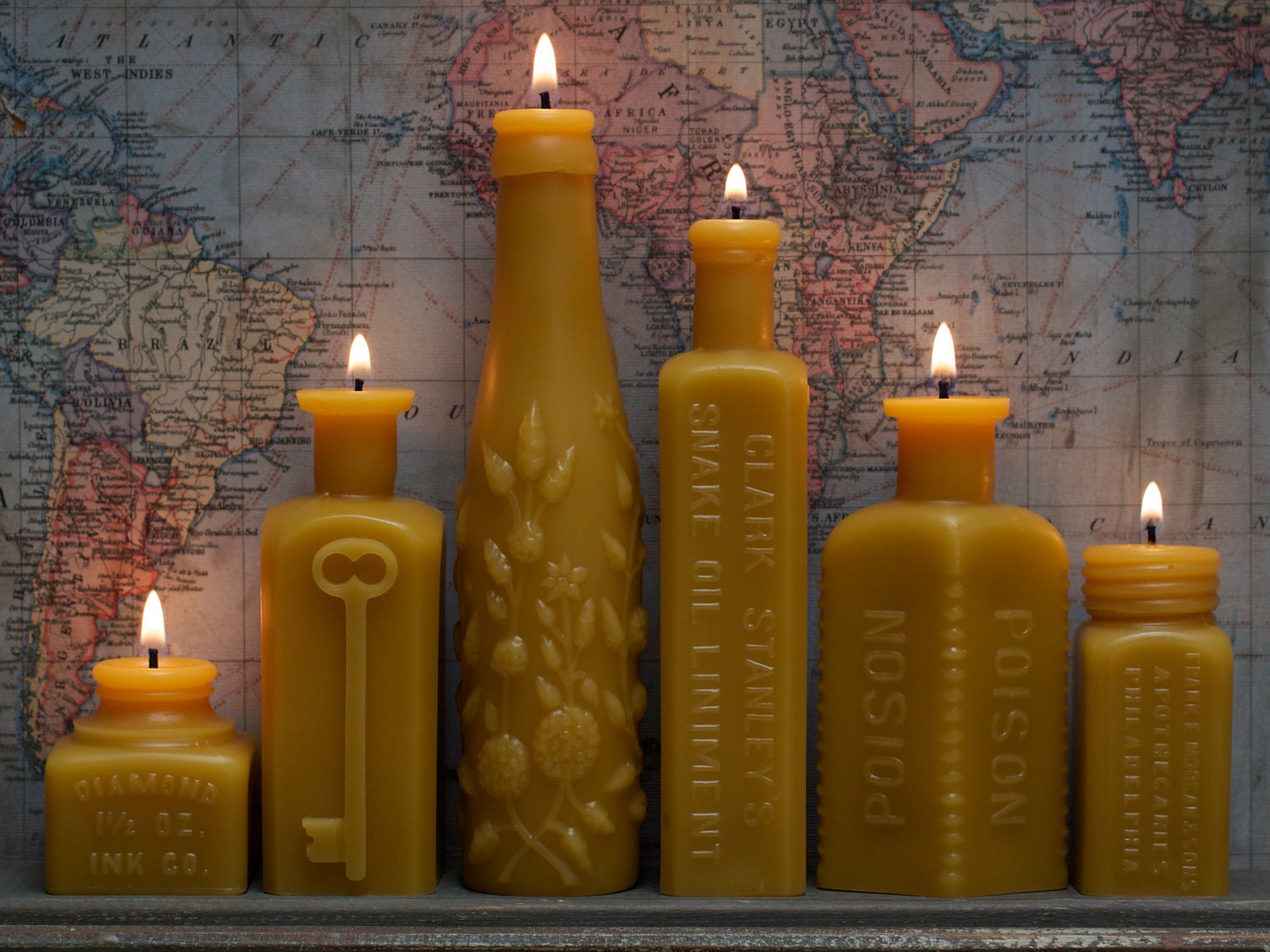 Beautiful beeswax candles based on antique bottle designs (links back
