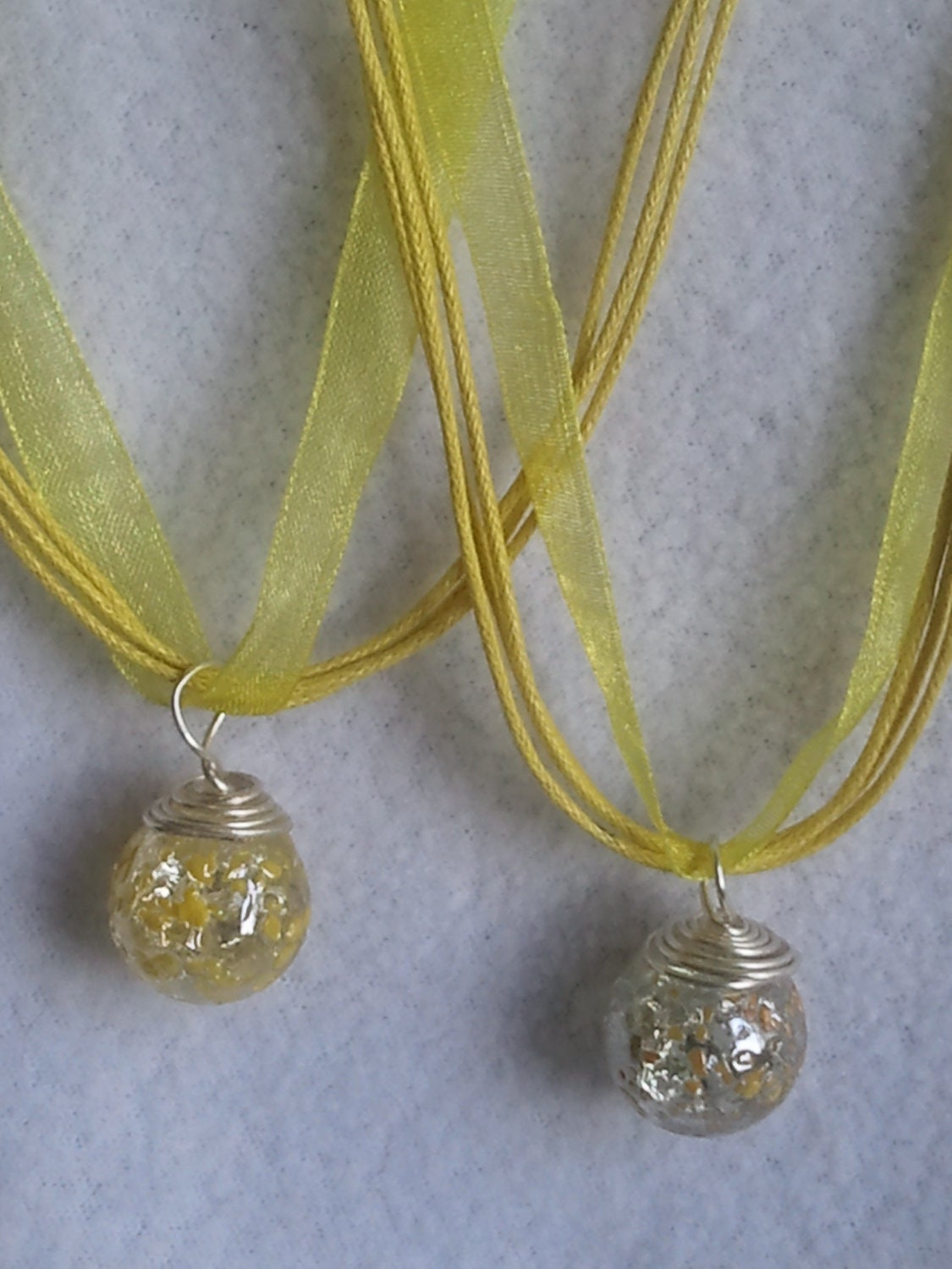 Fried Glass crackled yellow spotted Marble on a yellow ribbon Necklace