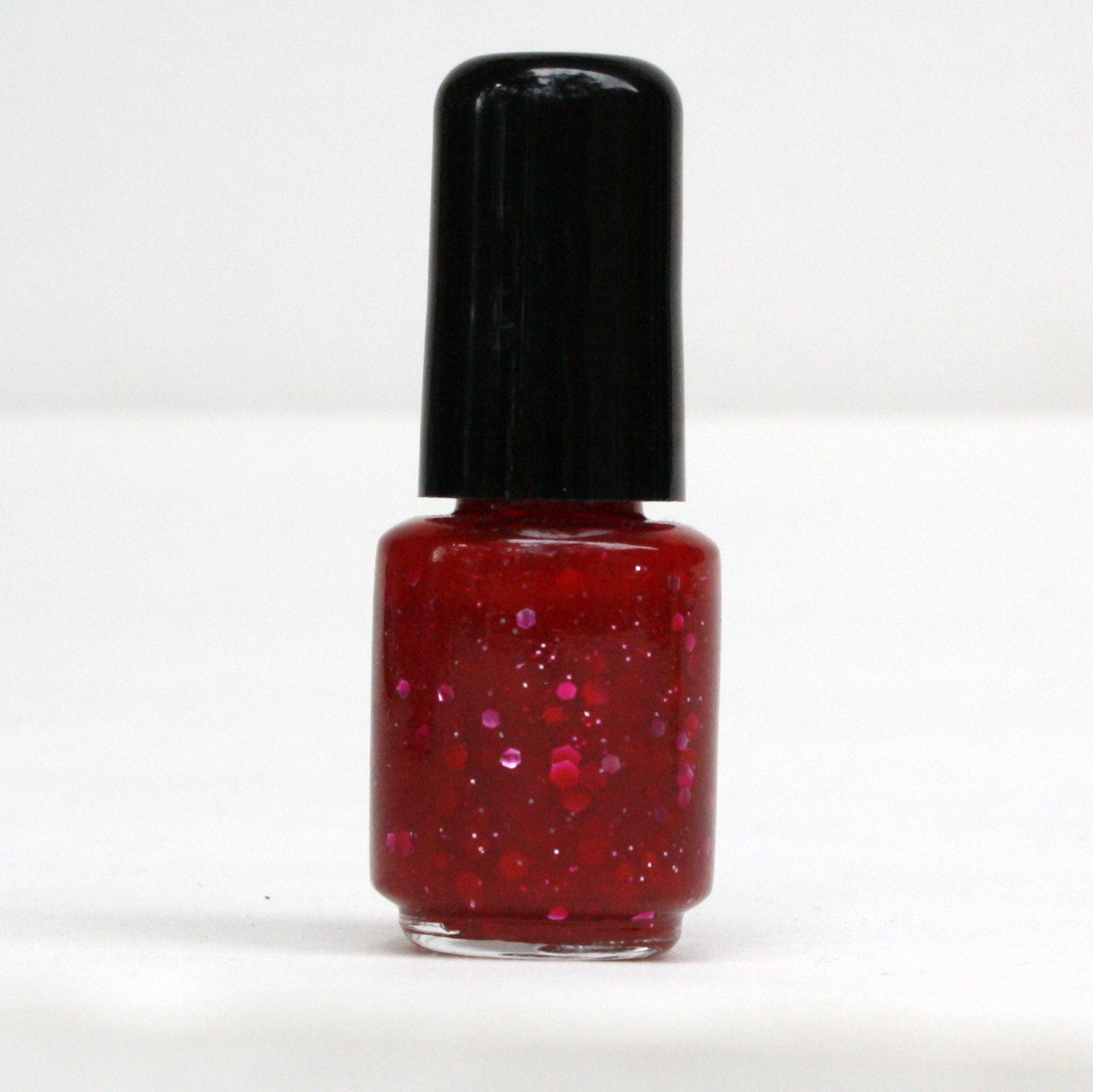 Mini Bottle Red glitter jelly nail polish Left Eye Red