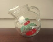 Vintage juice pitcher.  Ball shape tomato juice pitcher.