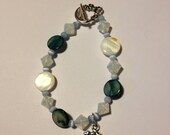 Riverboat-- Handmade Shell Bead & Charm Bracelet