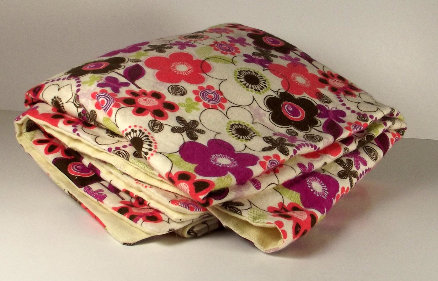 large baby blanket double sided multicolored flower motif, soft cozy beige flannel on back