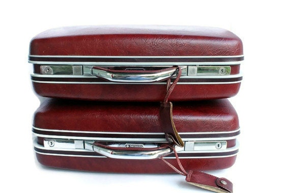 Oxblood Samsonite Silhouette Suitcase x two
