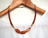 Vintage marbled red Onyx // Oxblood red braided leather // Necklace with gold plated chain