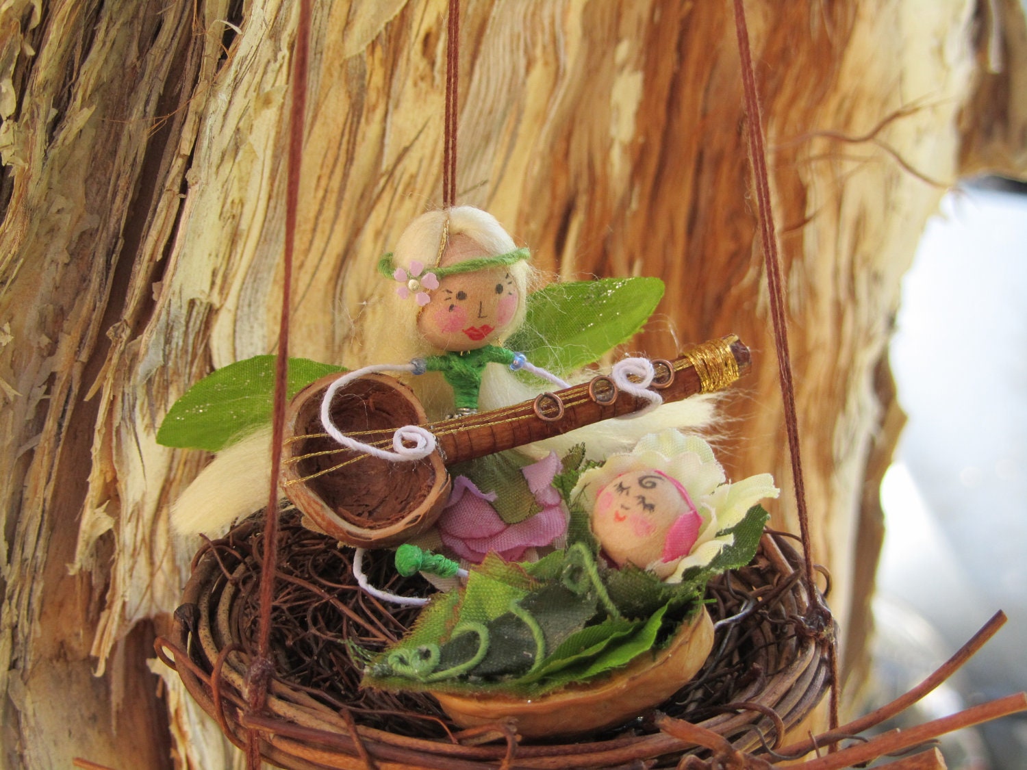A Mother Fairy Playing a Lullaby, on her Pixsitar, to her Baby Girl, Mobile