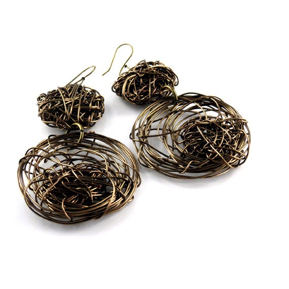 Stylish modern large long dangle earrings.  Brass colored non tarnished wire. Designed are Fashion Brand Faina sudio.