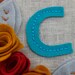 Monogram Initial Embroidery Hoop Art 5-Inch with Felt Flowers and Leaves Peacock, Red, Marigold and Goldenrod Handstitched by Catshy Crafts