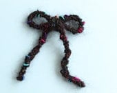 Large Black Multicoloured Knitted Bow Brooch made with Vintage Wool