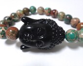 Green Magnesite Beaded Bracelet with Black Buddha