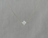 Delicate simple everyday tiny sideway alhambra ivory mother of pearl clover necklace