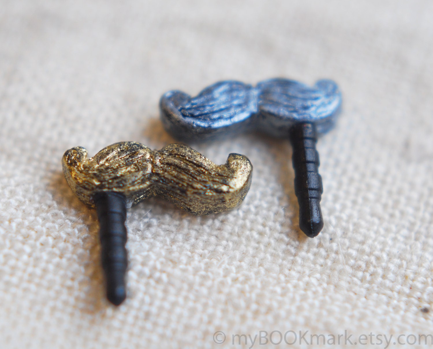 Mustache phone accessory. Set of 2. Movember dustplugs for earphone jack. iPhone 5 4 4s ,iPad ,Samsung galaxy s2 s3, 3.5mm output.  for all