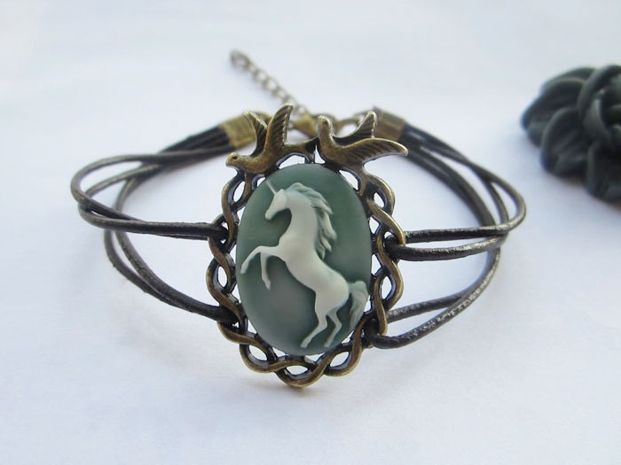 Bracelet---antique bronze love birds with blue resin unicorn&brown leather chain