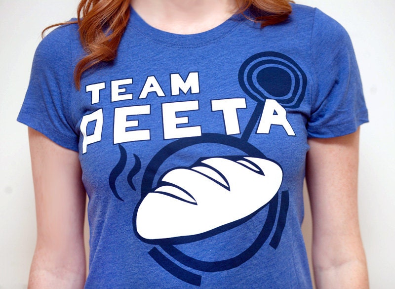Women's Hunger Games Team Peeta T-Shirt with Bread Graphic, Blue, SIZE EXTRA LARGE